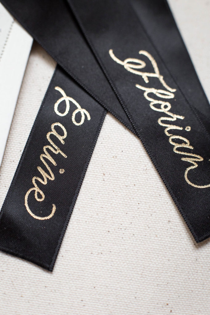 Sanda Letter calligraphy and engraving in Switzerland hot foil on black ribbon